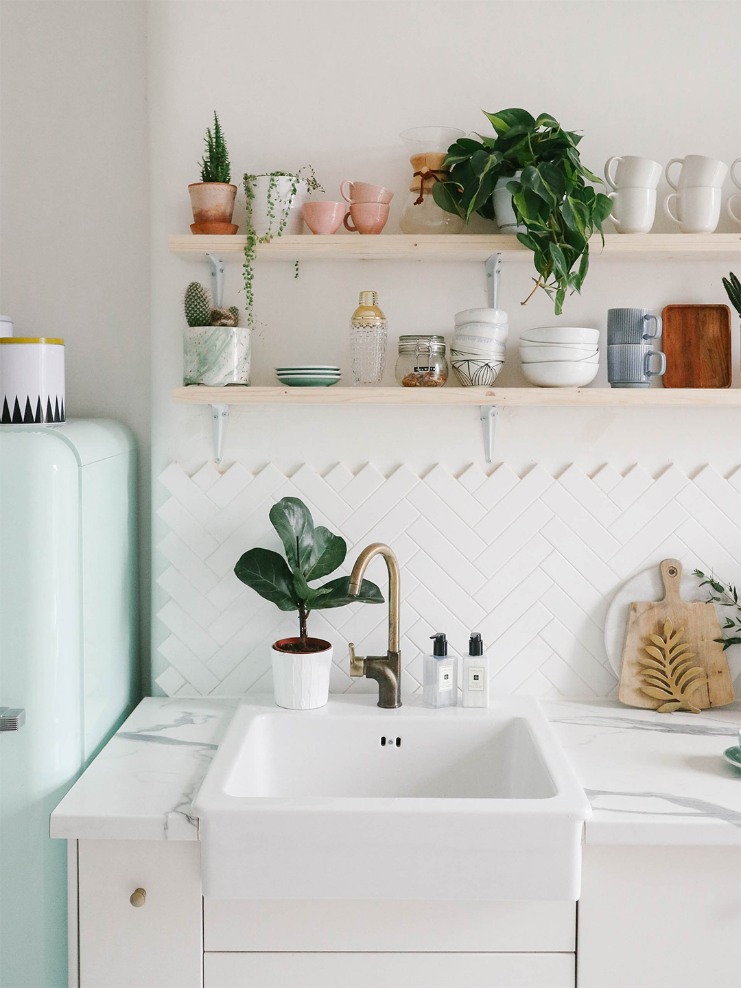 Kitchen with mint fridge and open shelving