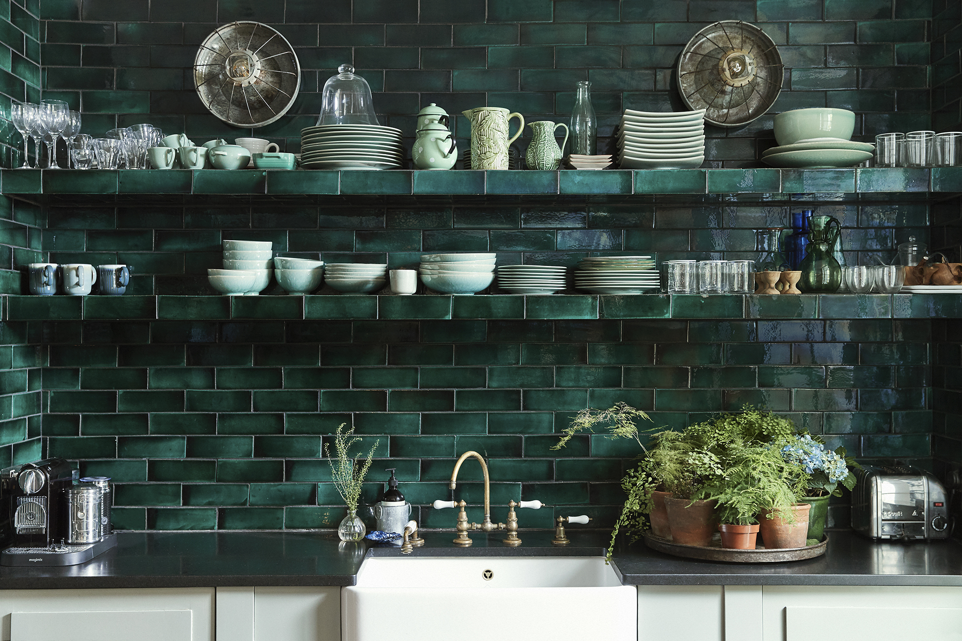 emerald green–tiled kitchen