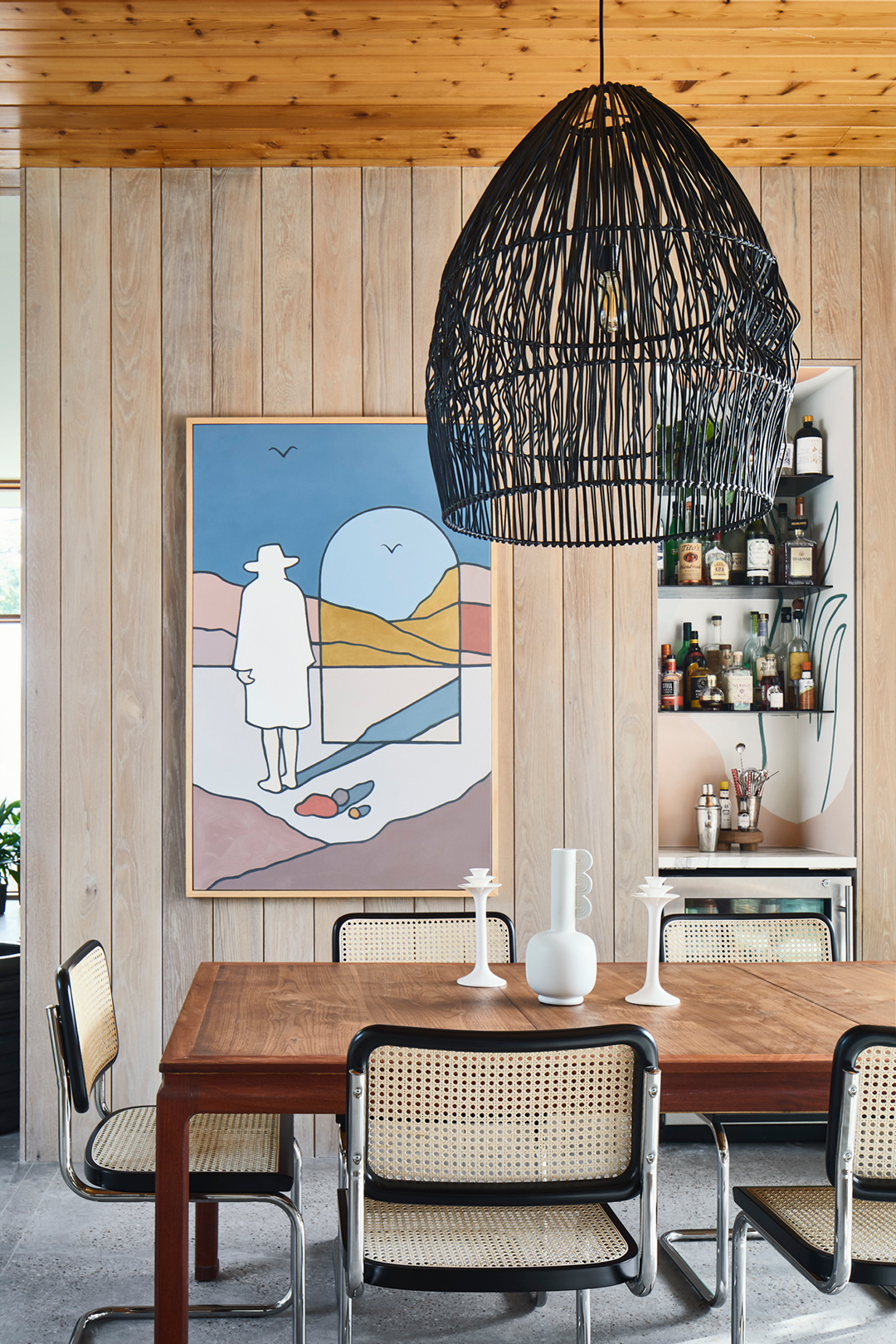 Dining room with wood paneled walls