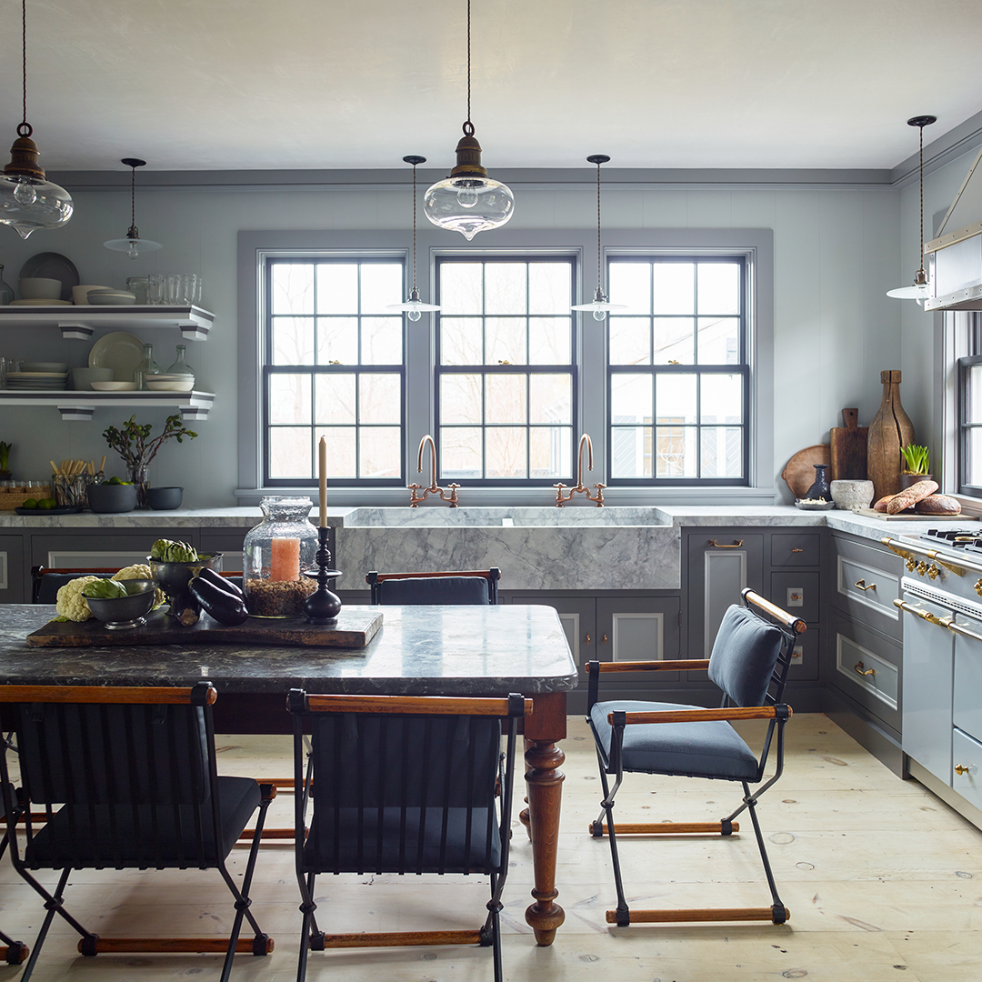 Blue kitchen with marble counters