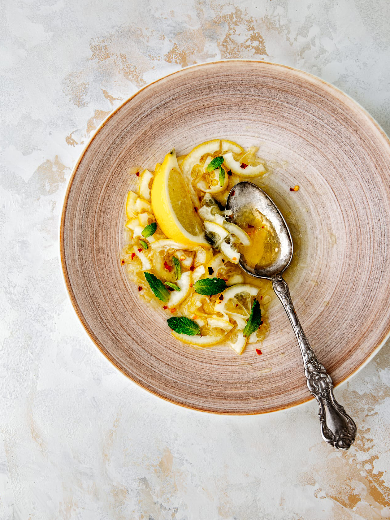 lemon salad on pink plate