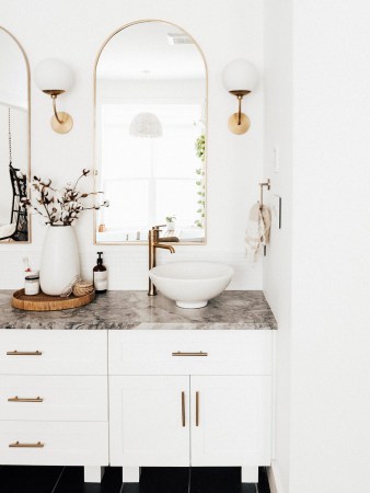 white bathroom vanity with gray counters