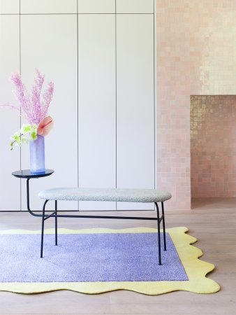 pink room with lilac and neon yellow rug