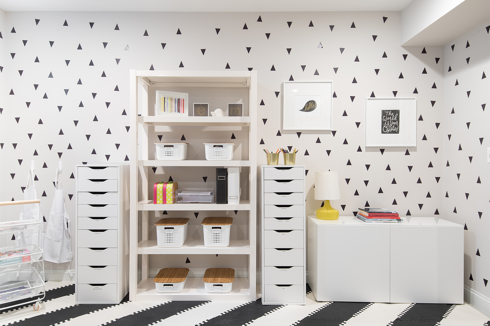 black and white wallpaper and shelves fro kids crafts