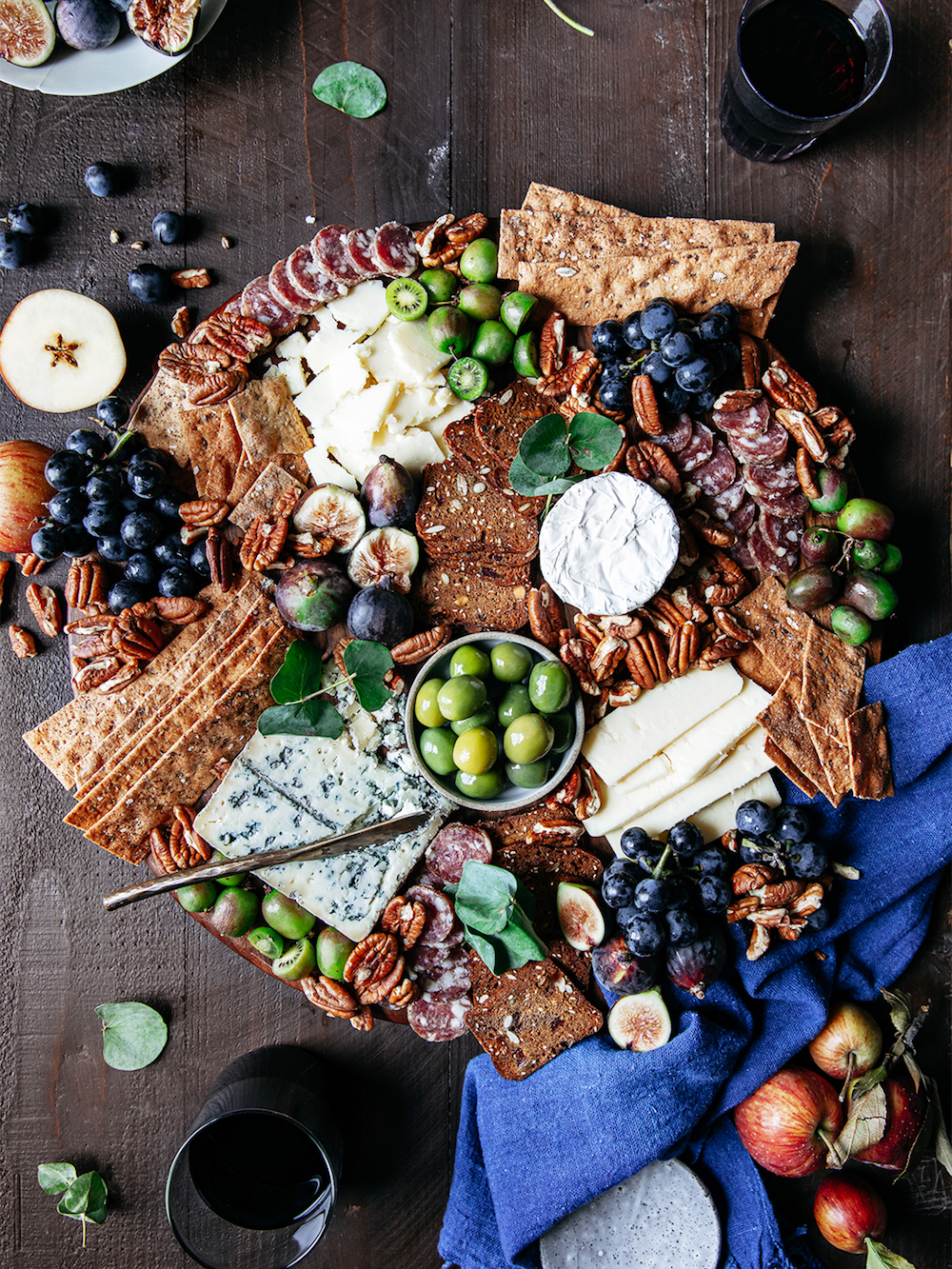 cheeseboard with olives and salami