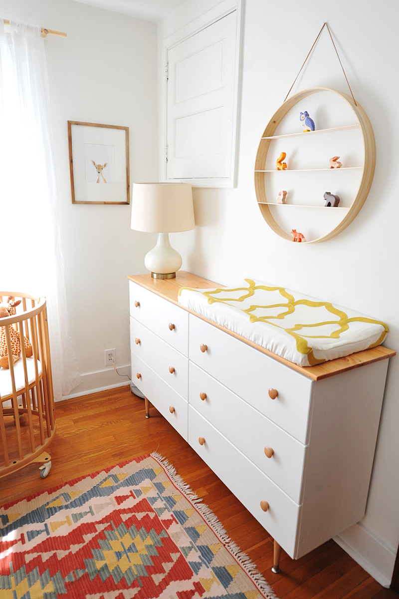 white dresser in a nursery