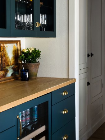 bar with blue cabinets