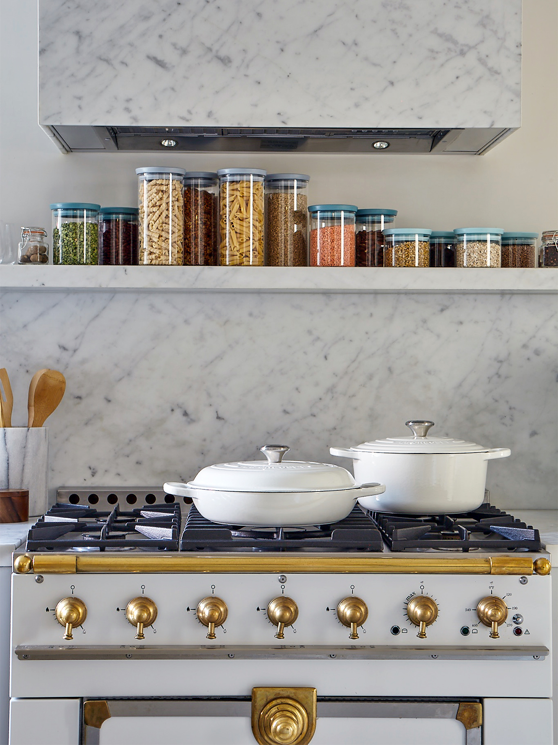 white stovetop with white pots