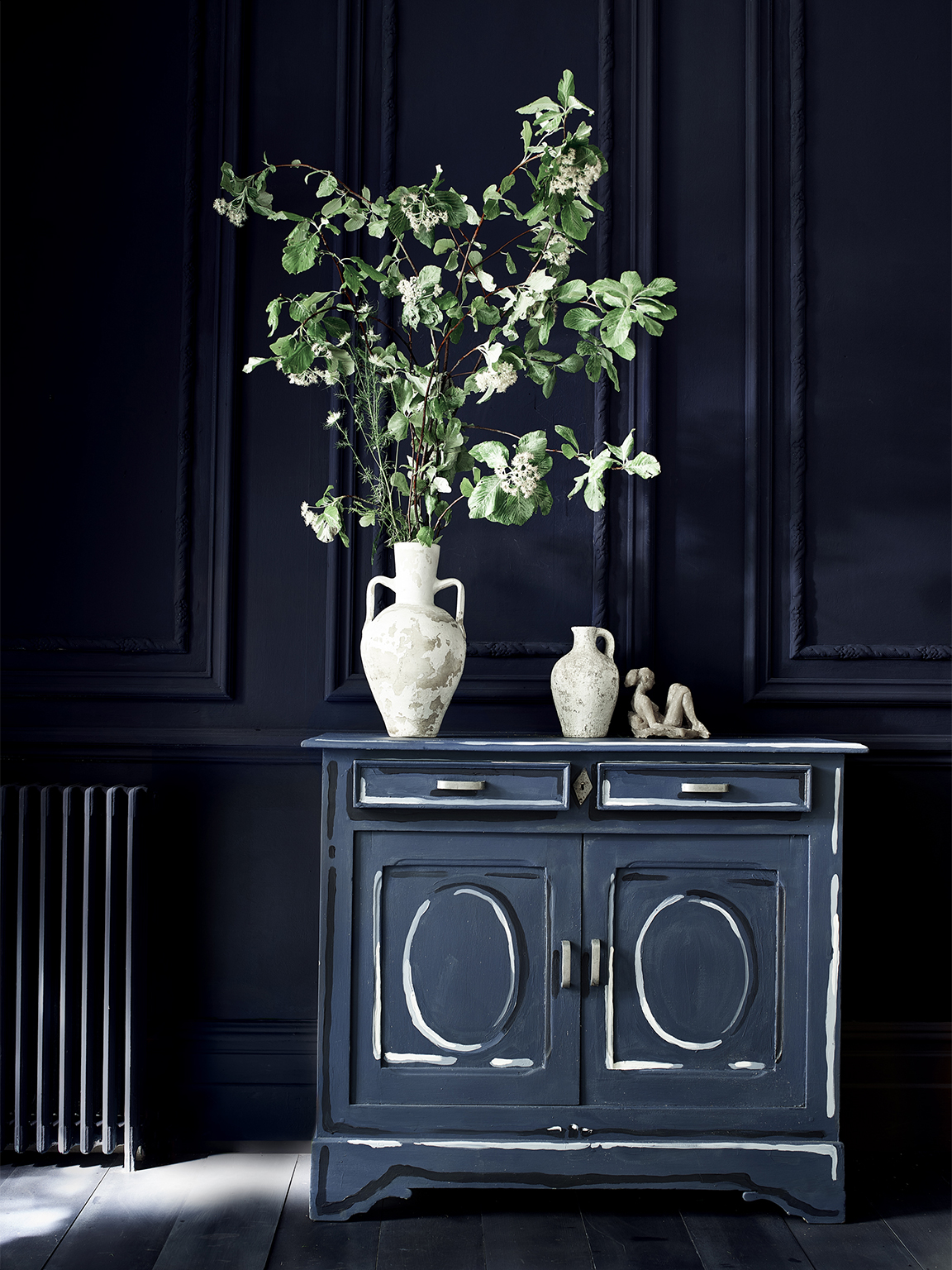 vignette with blue dresser with trompe l'ceil effect