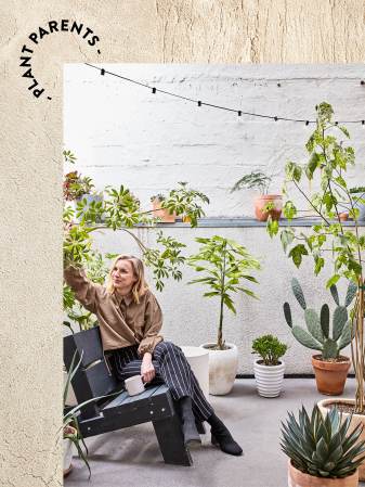 woman in a chair in an outdoor garden