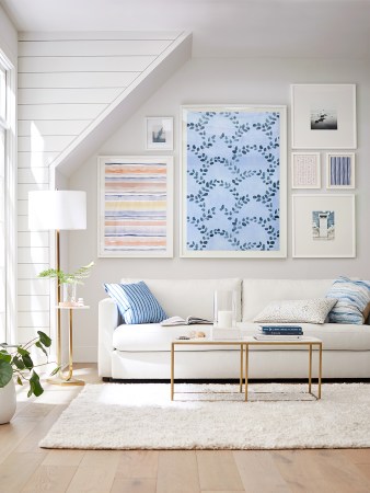 living room with Rebecca Atwood prints on wall