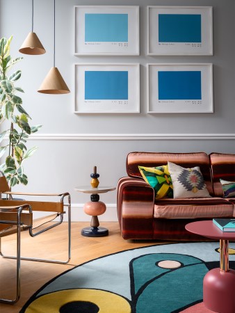 Pink striped velvet sofa in Sam Buckley's Edinburgh apartment