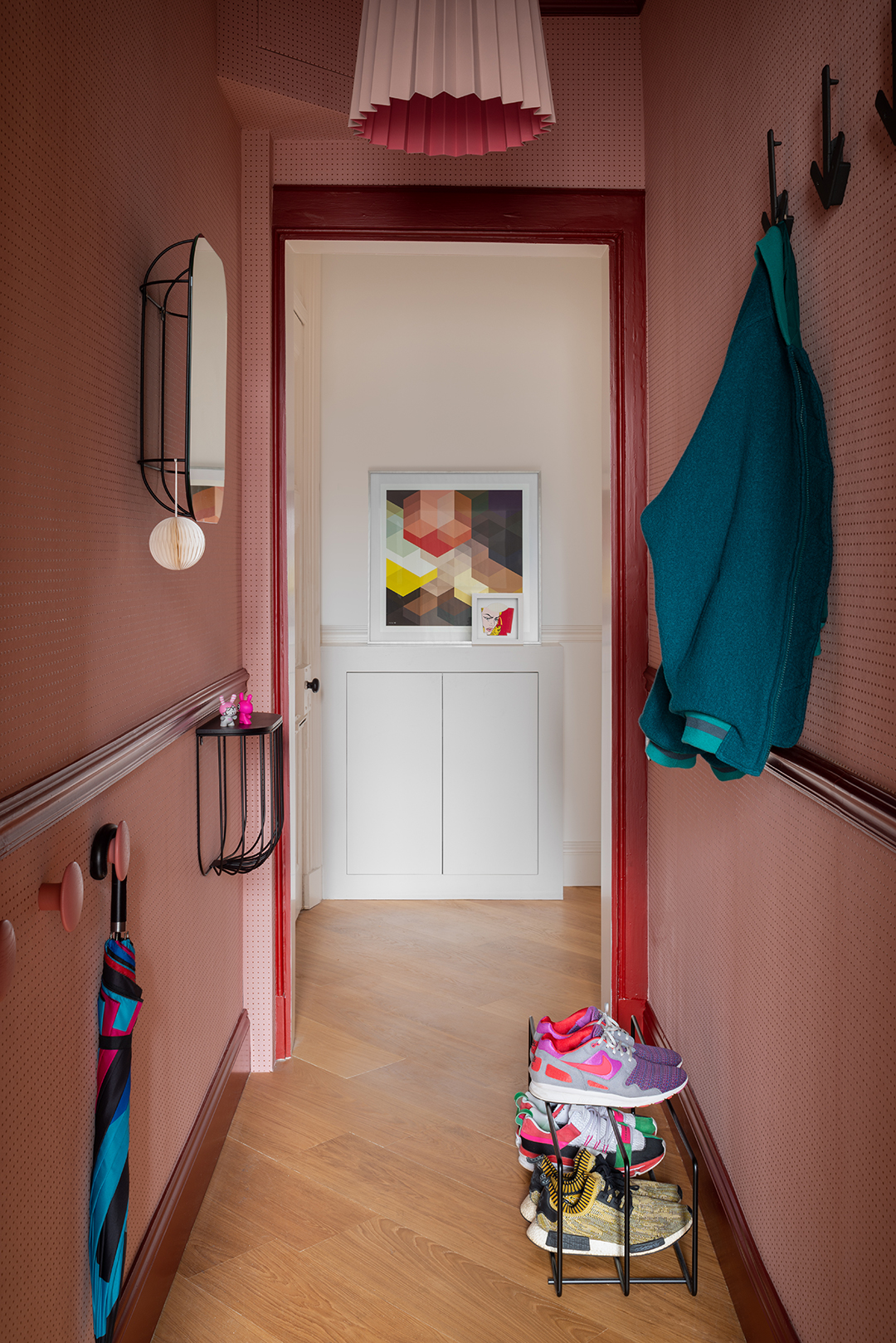 Pink dotted wallpaper in Sam Buckley's Edinburgh apartment