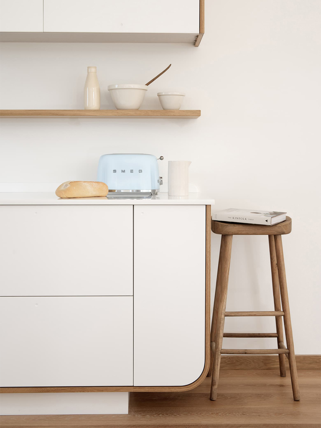 white kitchen counter with blue toaster