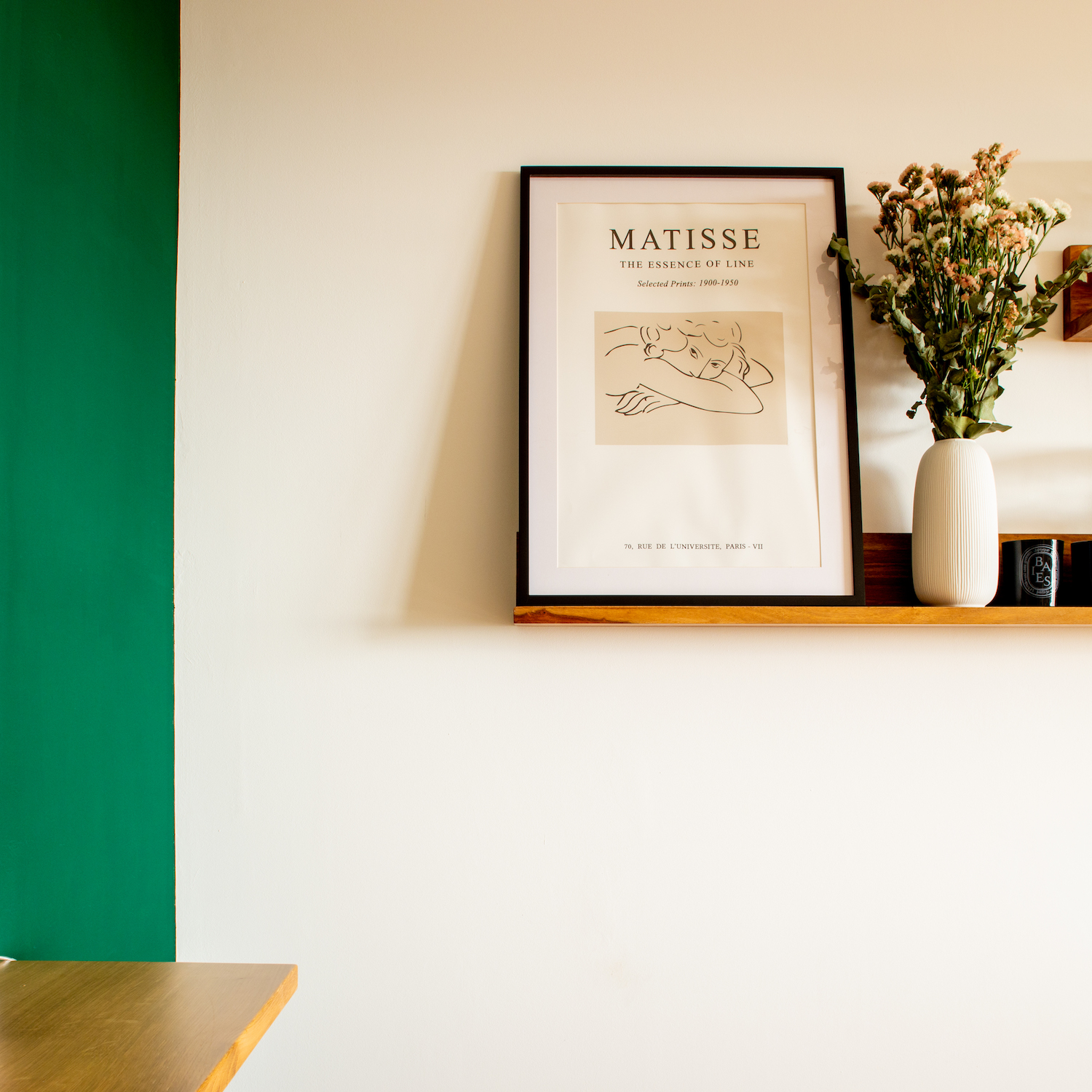 green paint and shelf with florals