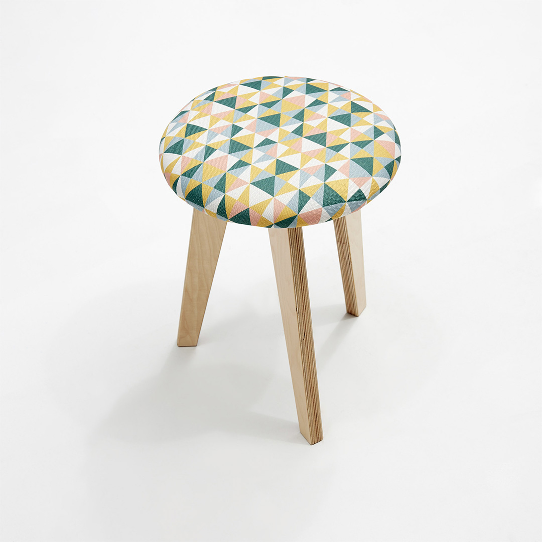 round pink and green stool