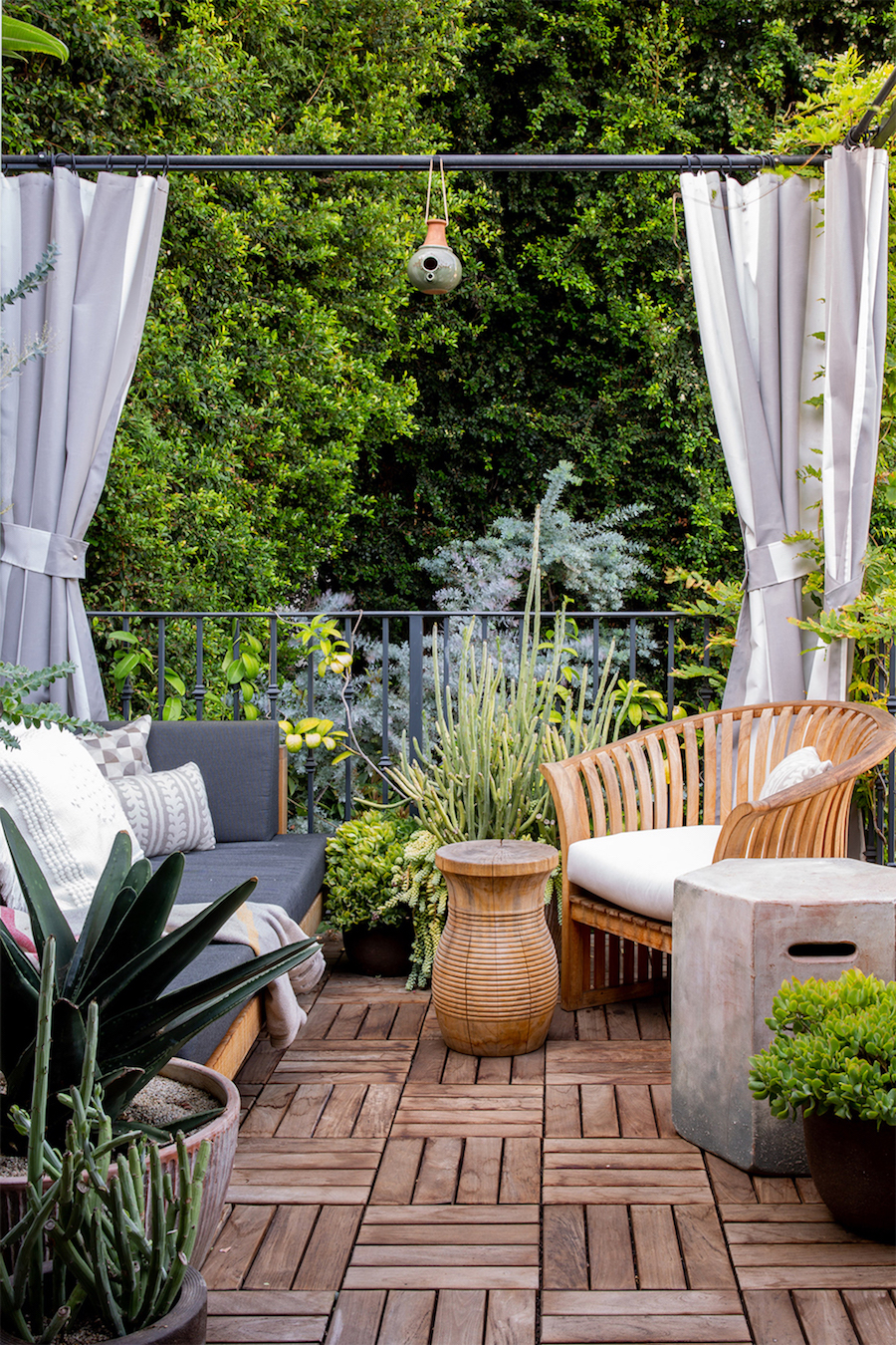 cabana with daybed and bird house