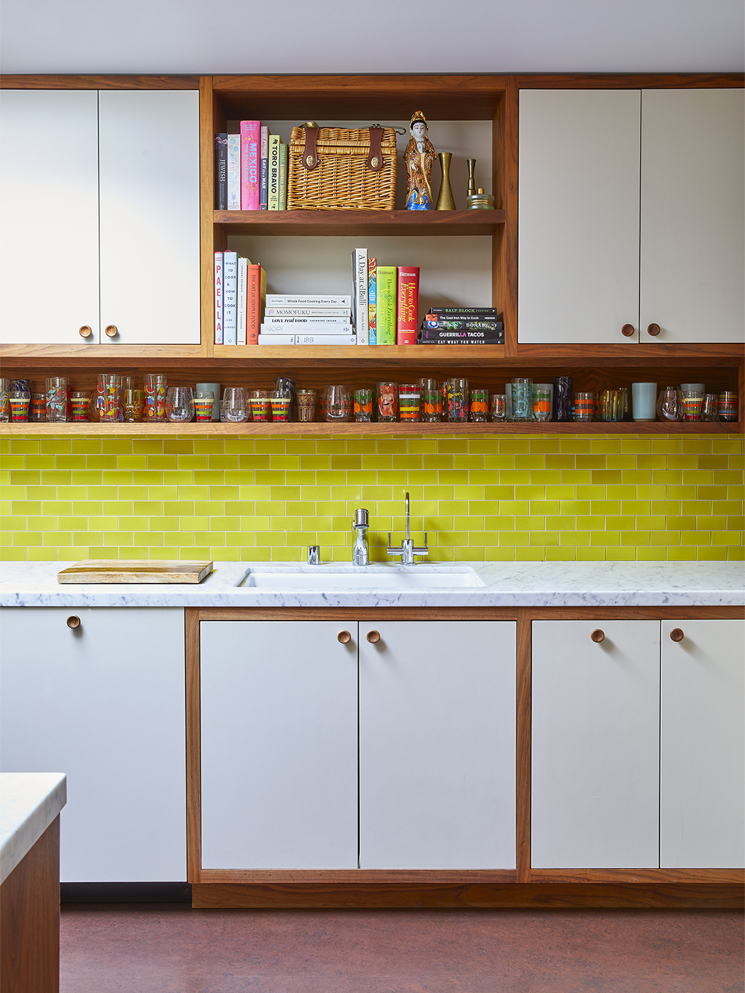 neon yellow backsplash with white and wood cabinets