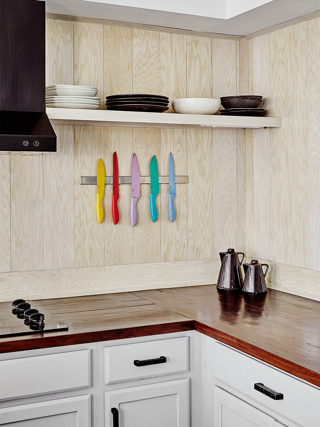 light wood backsplash with dark wood counters