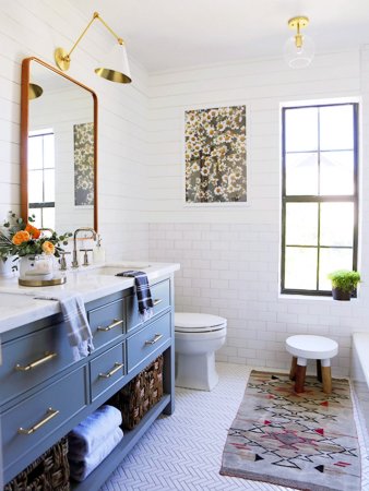 blue bathroom with mirror