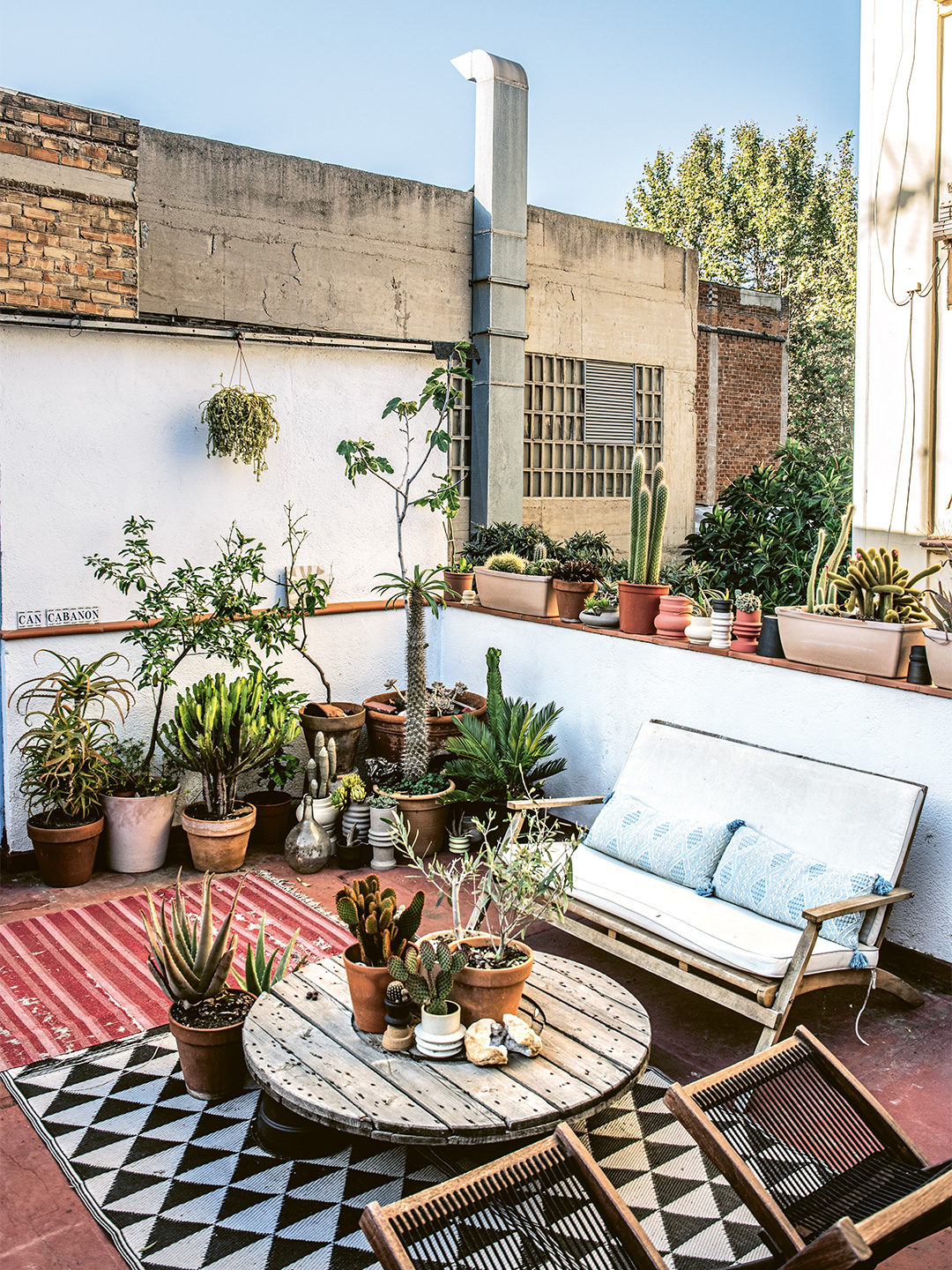 sofa and table outside on tiled patio