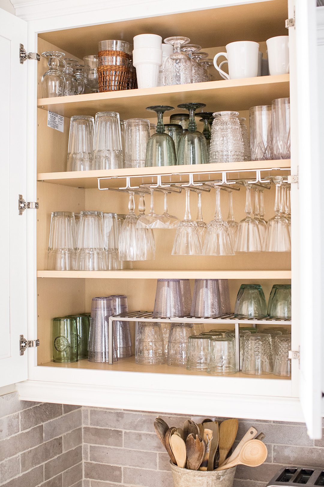 cabinet with organized glassware