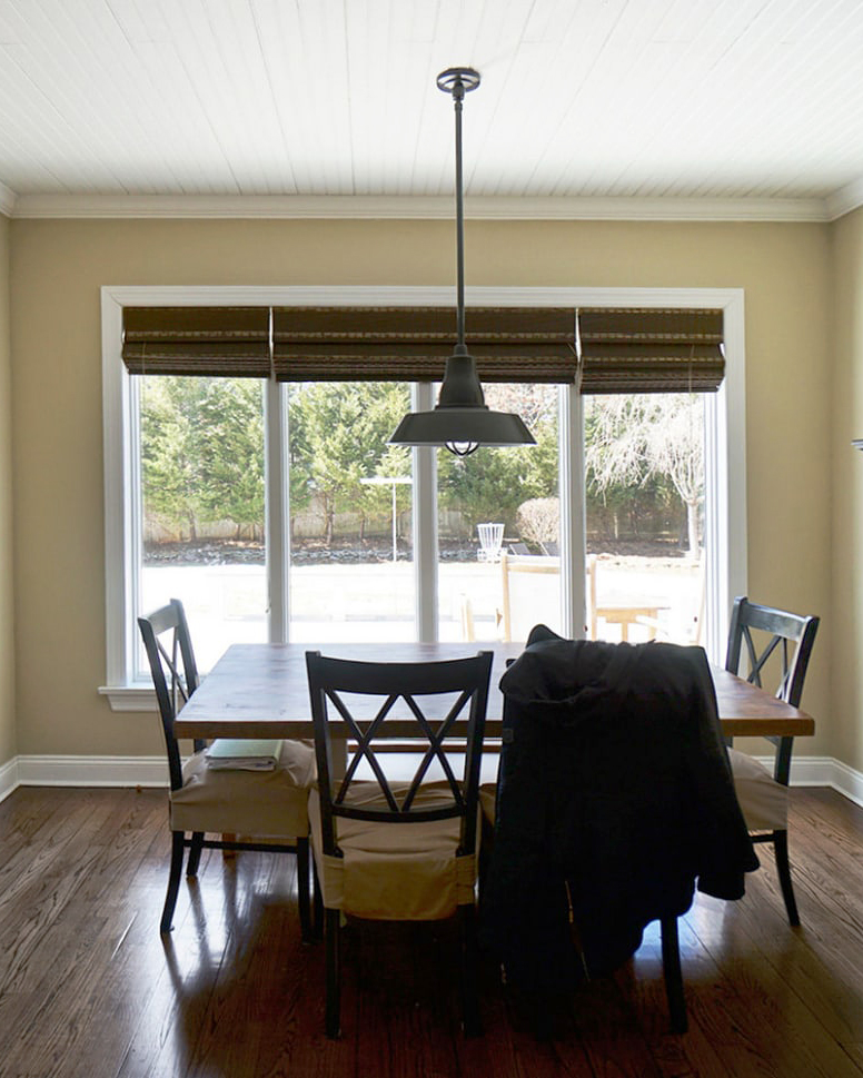 dated dining room with wood furniture