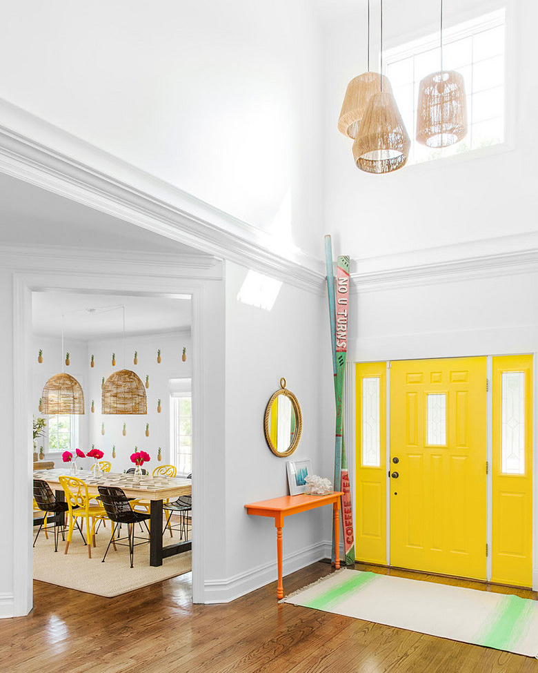 entryway with big yellow doors