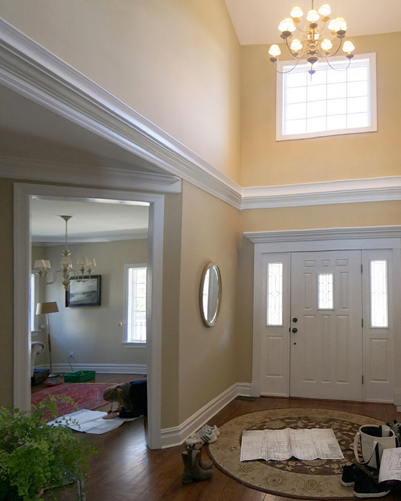 neutral colored entryway with double doors