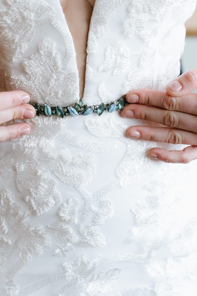 white dress with blue belt