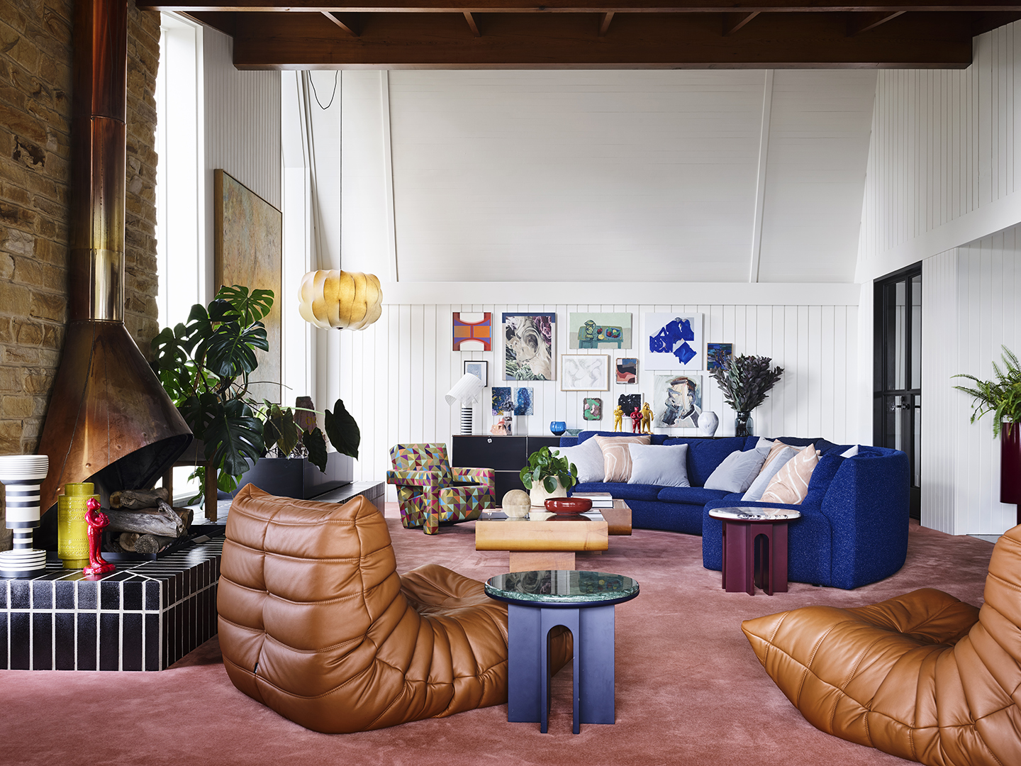 living room with leather armchairs