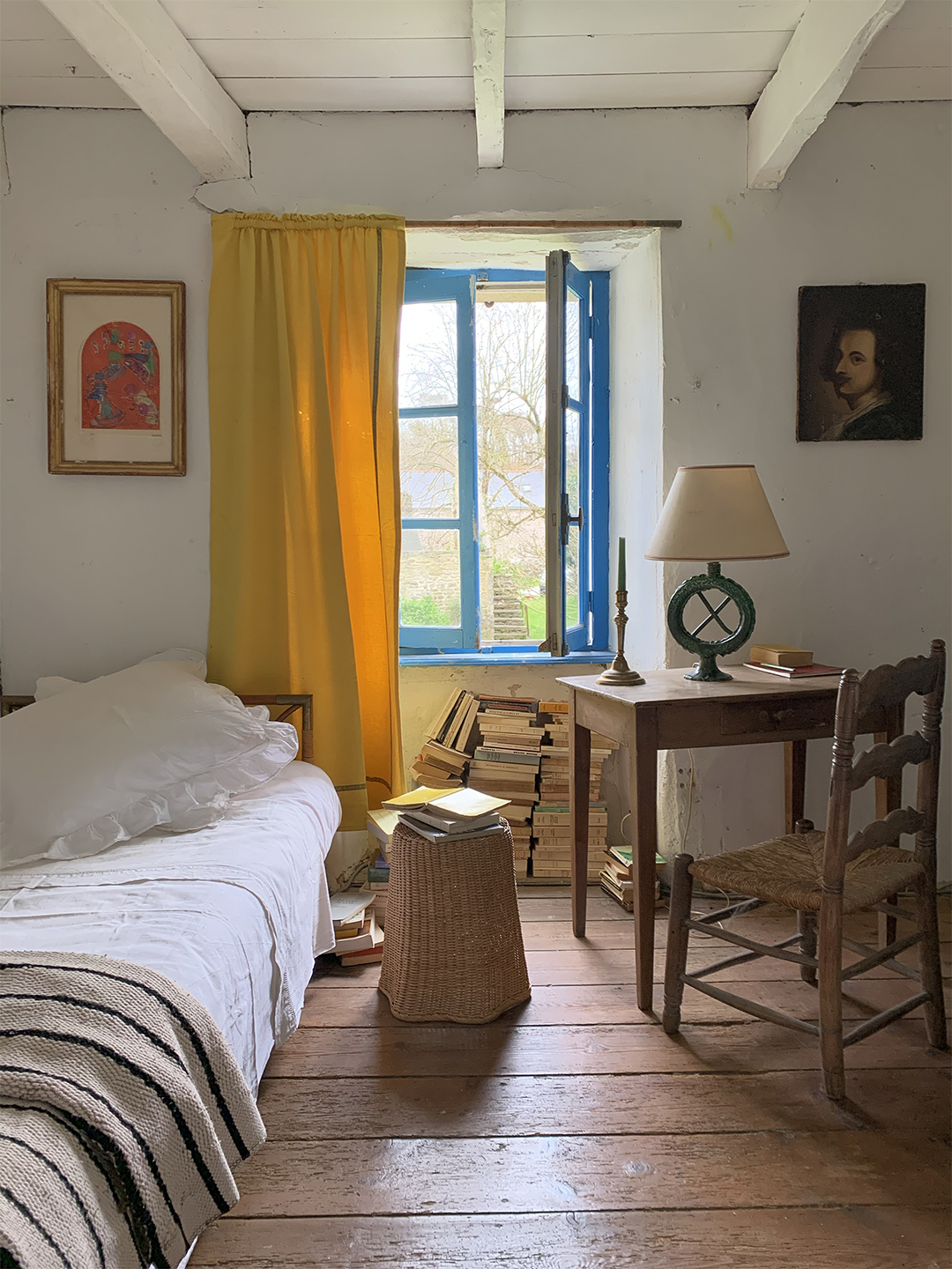 French country bedroom with yellow curtains