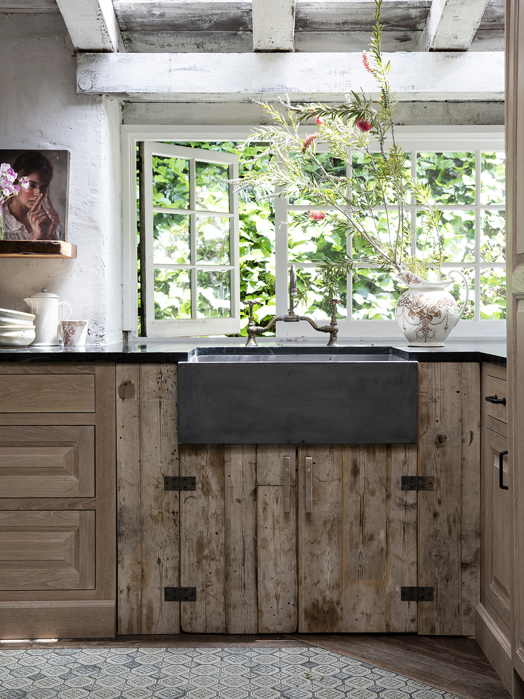 wood kitchen lower cabinets with black sink