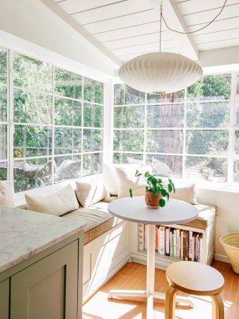 bright breakfast nook with surround windows