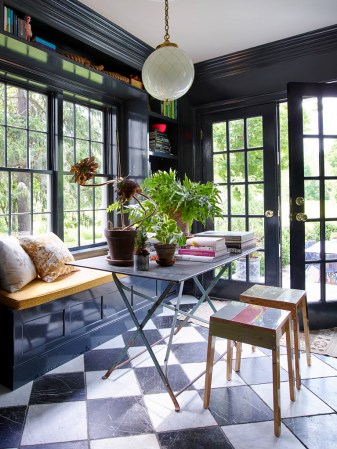 Library with black lacquered walls