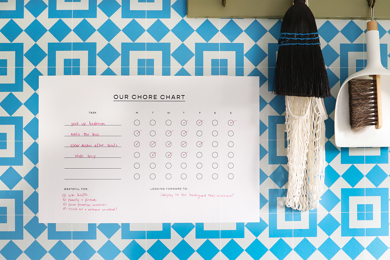 blue tile wall wiht chore chart