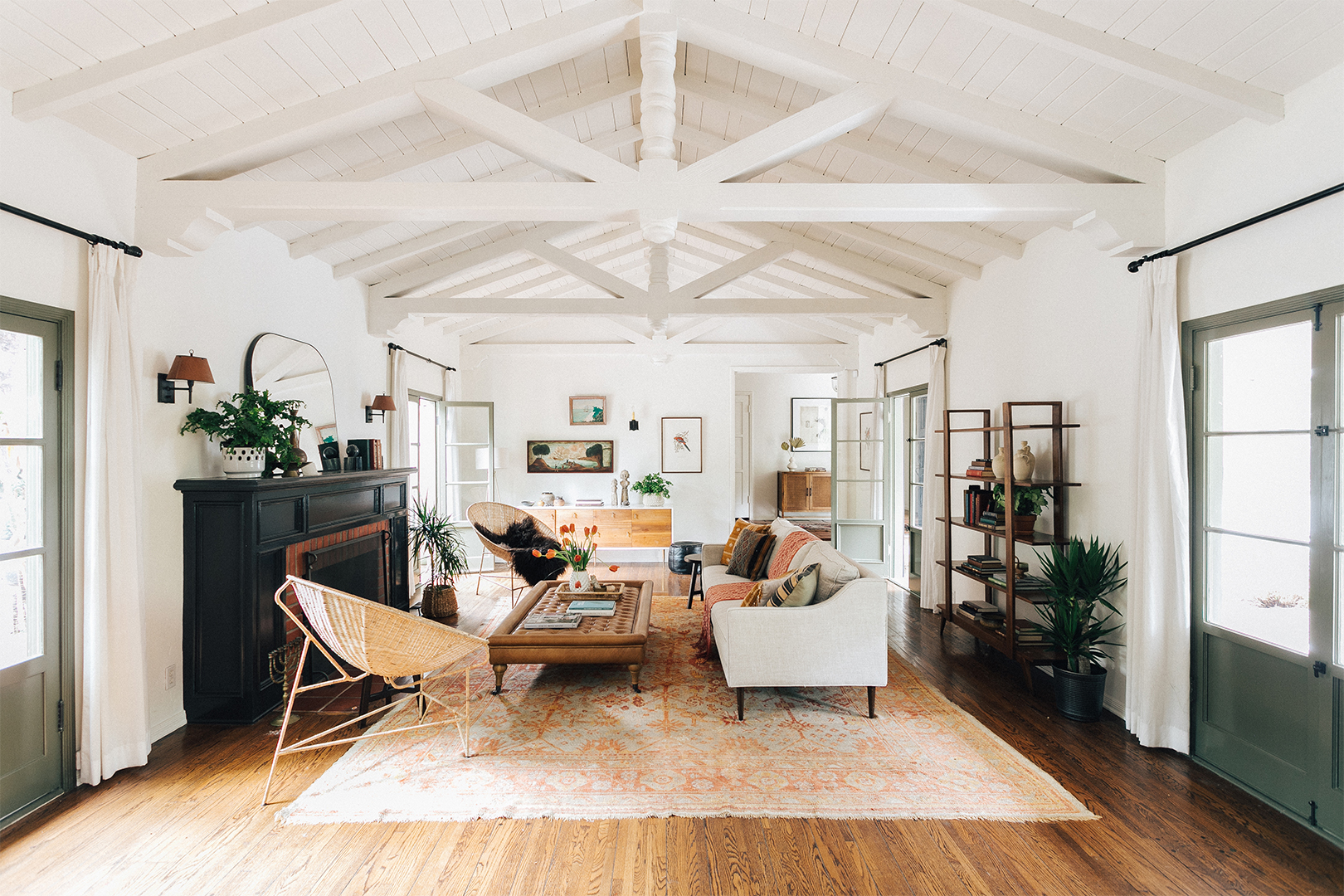 living room with white ceiling beams