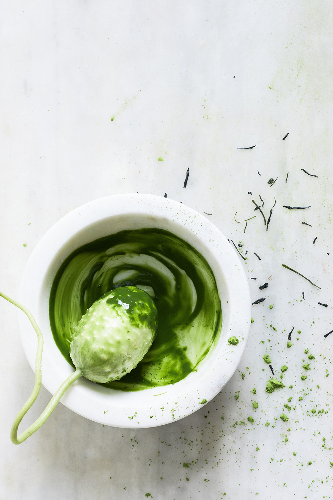 green mixture in white bowl