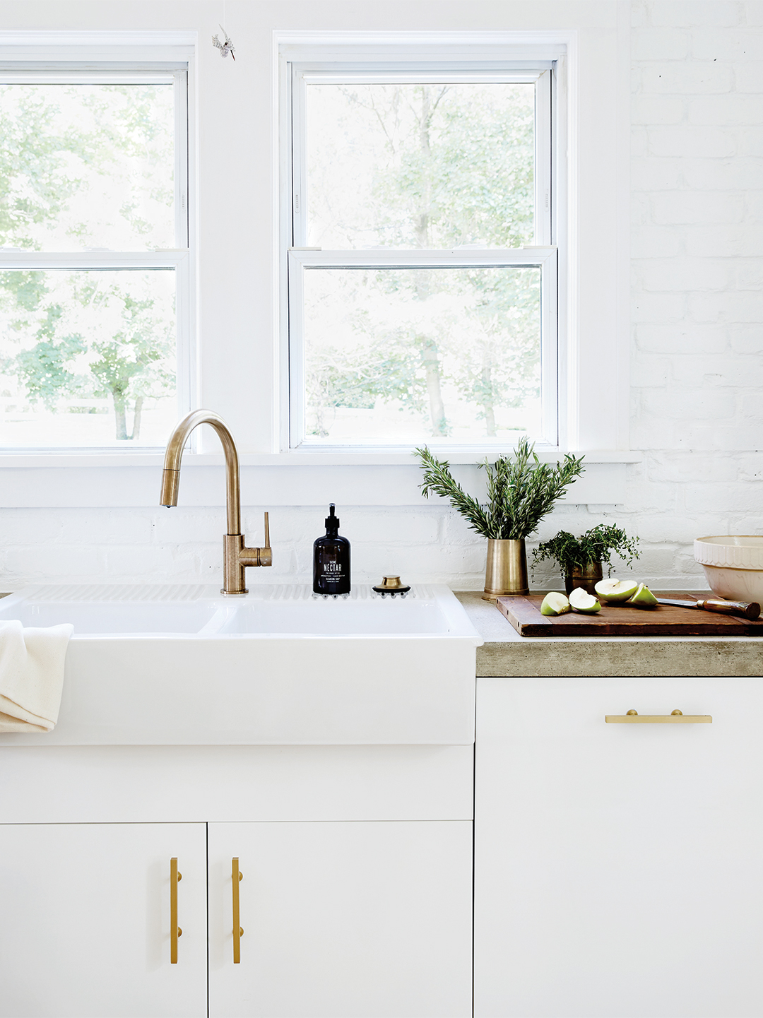 white kitchen with farmhouse sink