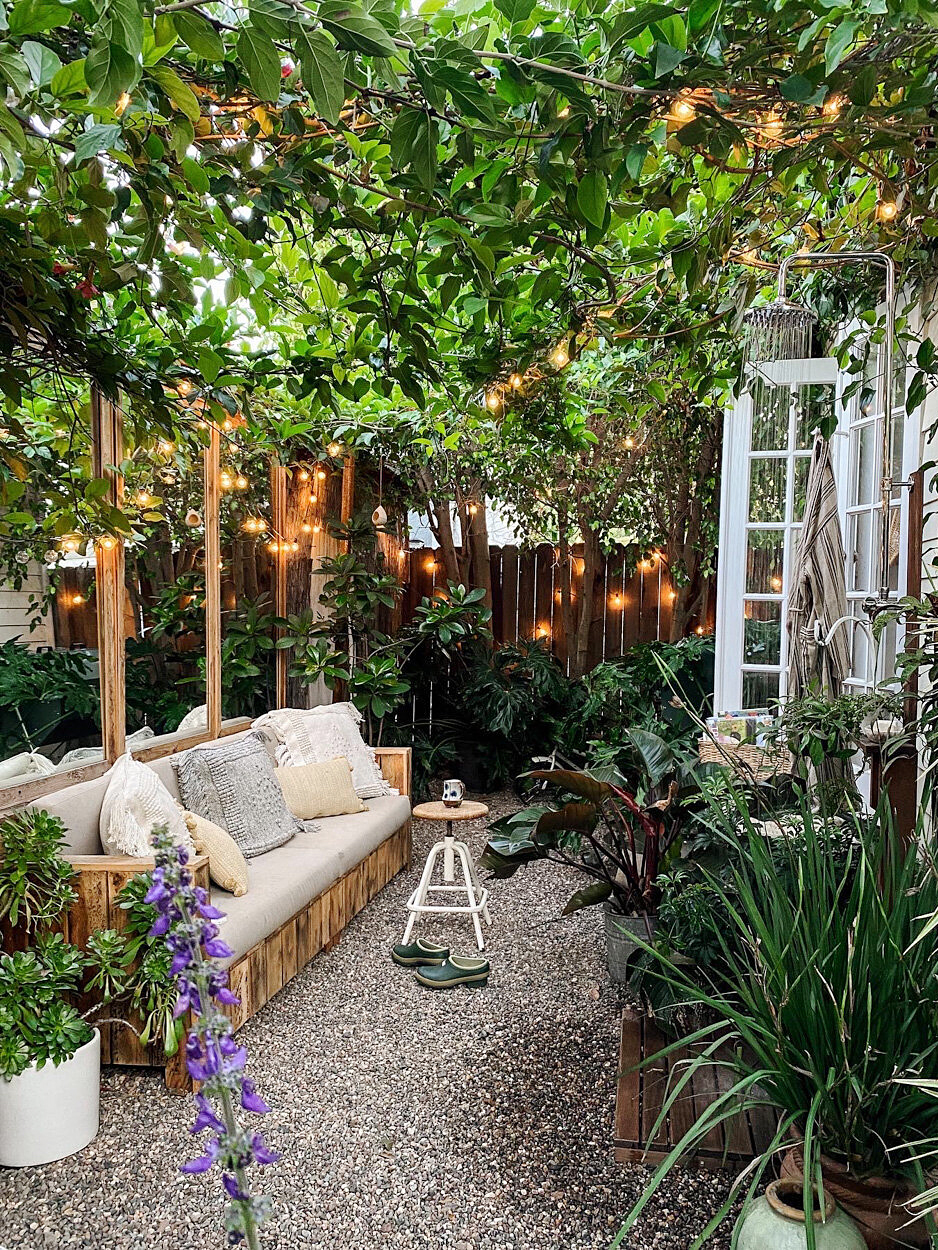 backyard with lots of trees and fairy lights