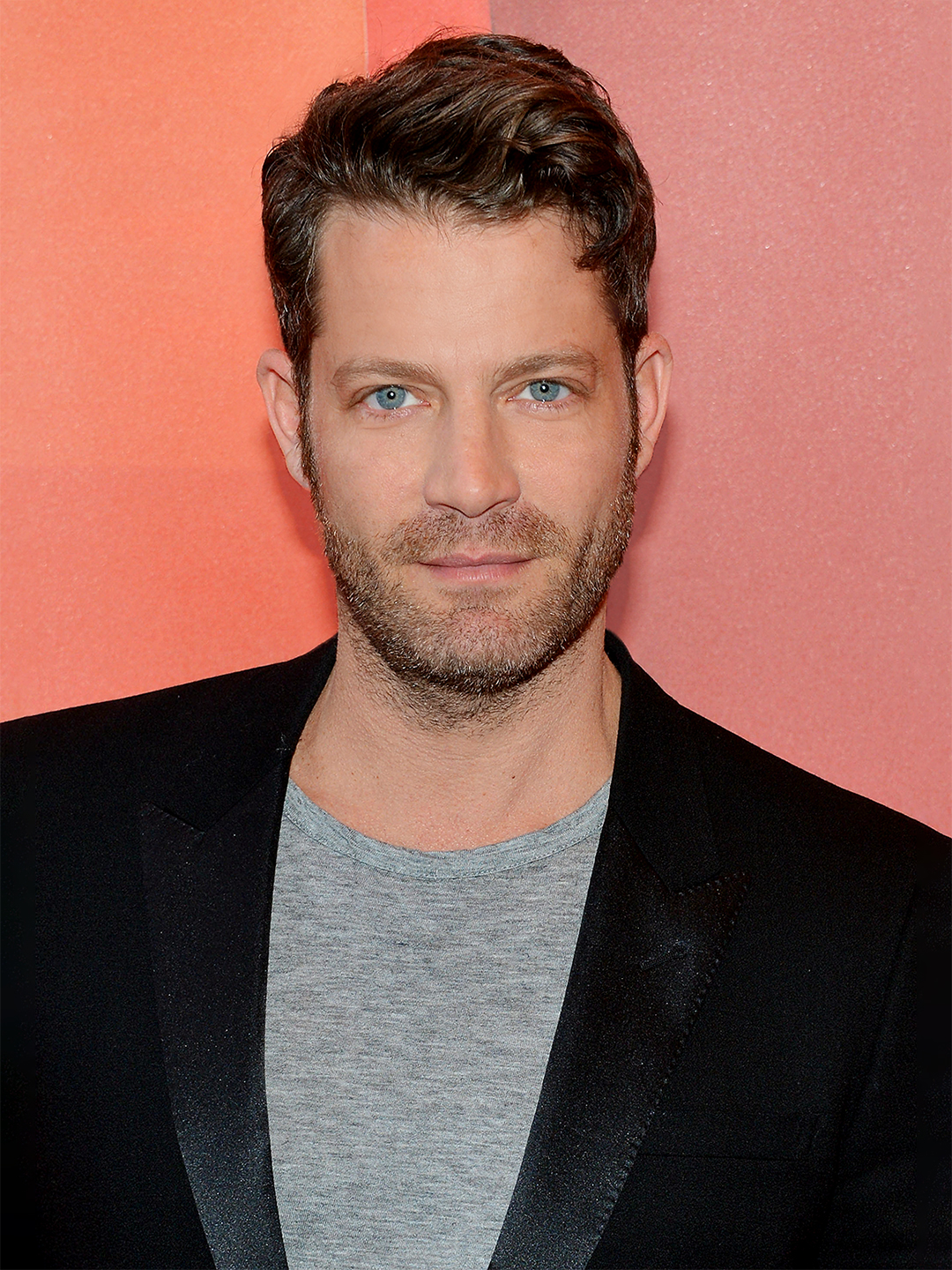 nate berkus on a pink background