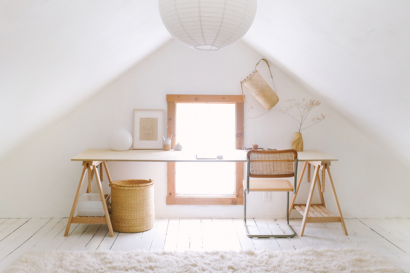 white desk space with lantern pendant