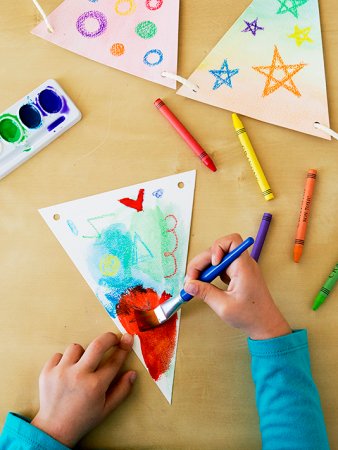 kid drawing on paper