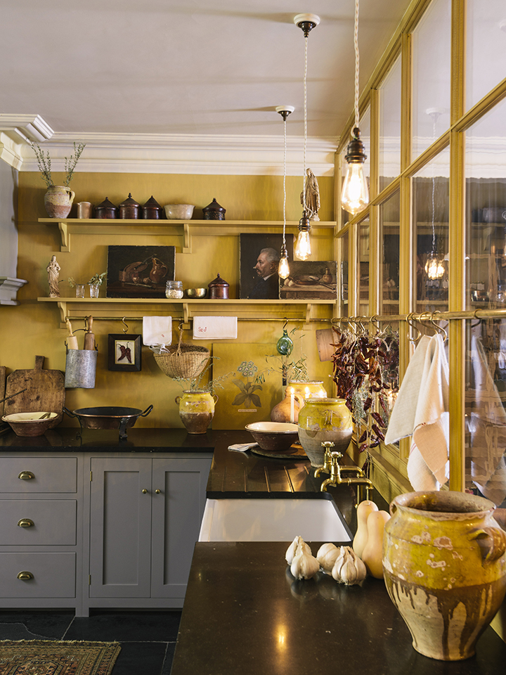 yellow kitchen with open shelving