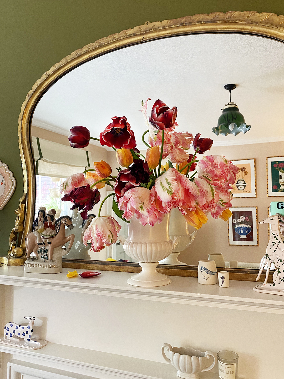 Mantle with vase full of tulips