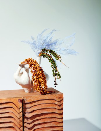 dresser with vase and florals