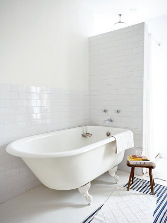 white bathroom with free standing tub