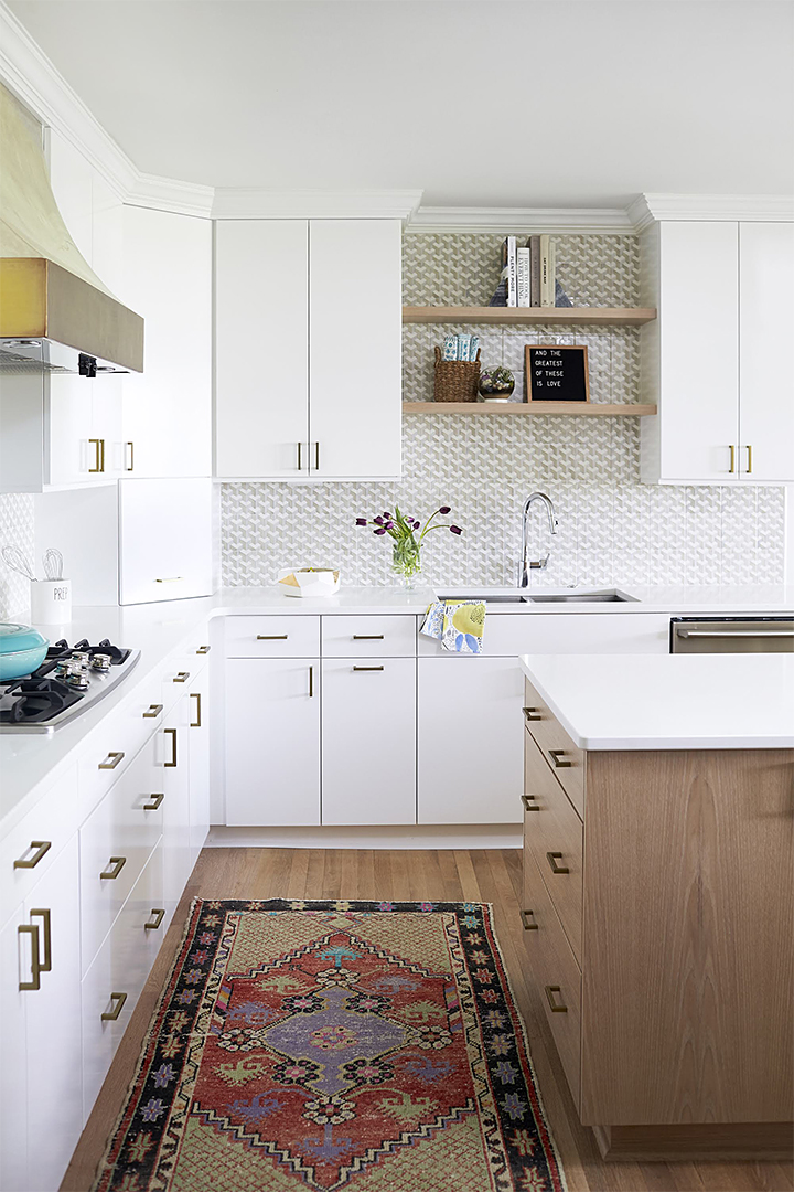 white kitchen with wood island