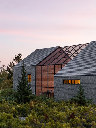 sunset coming down on a house