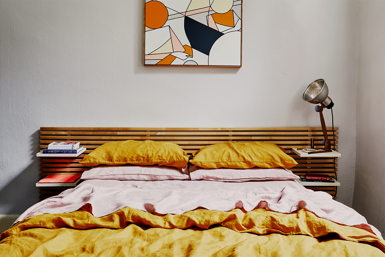 Bed with yellow duvet